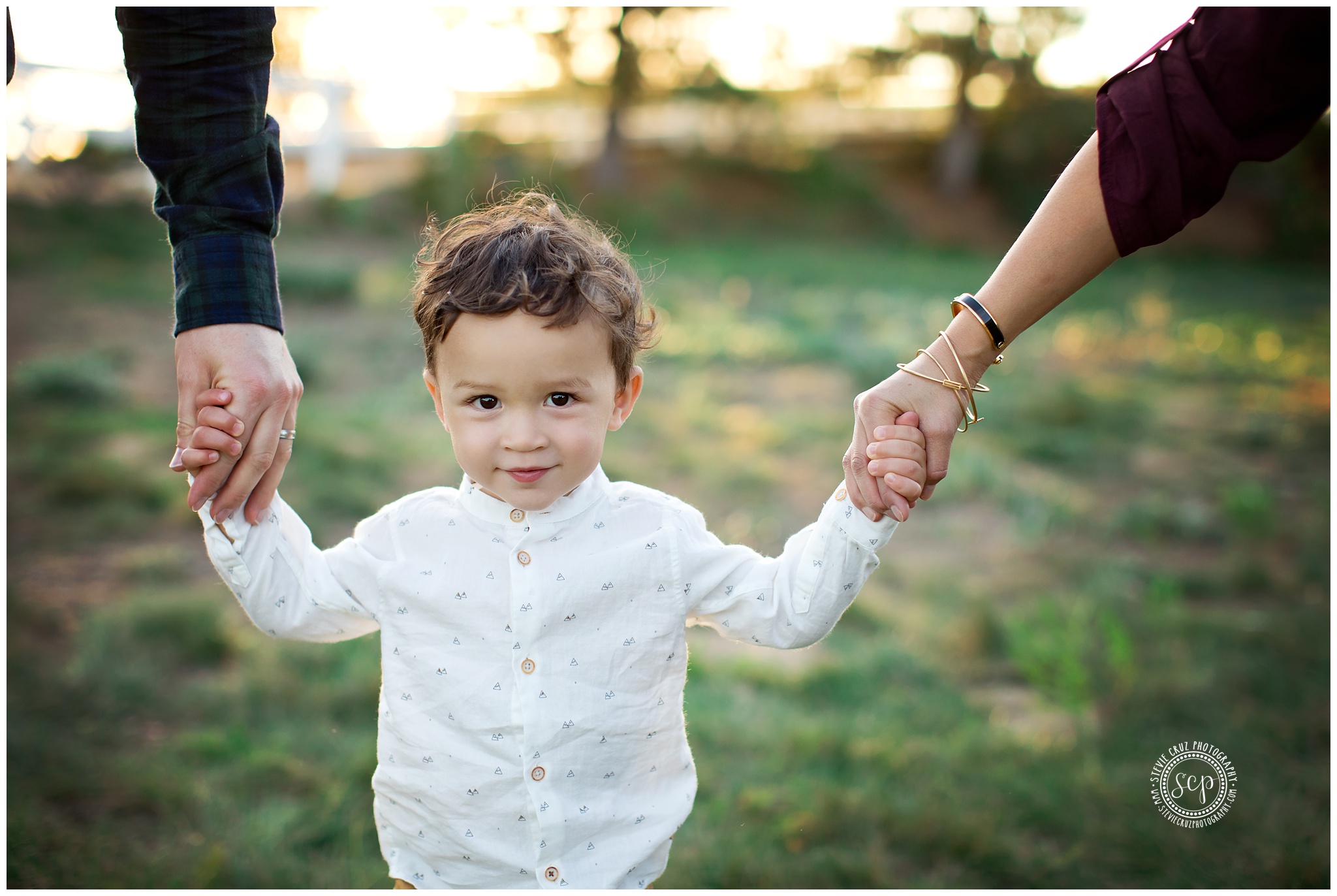 Orange County captures sweet candid moments of toddler boy during family pictures
