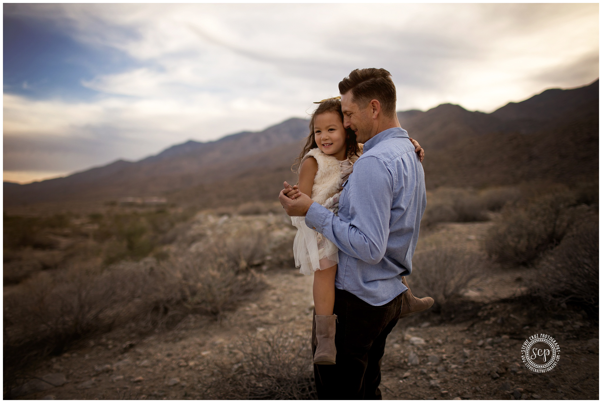 Photo of dad carrying his little girl in Palm Desert California. These family pictures are so precious