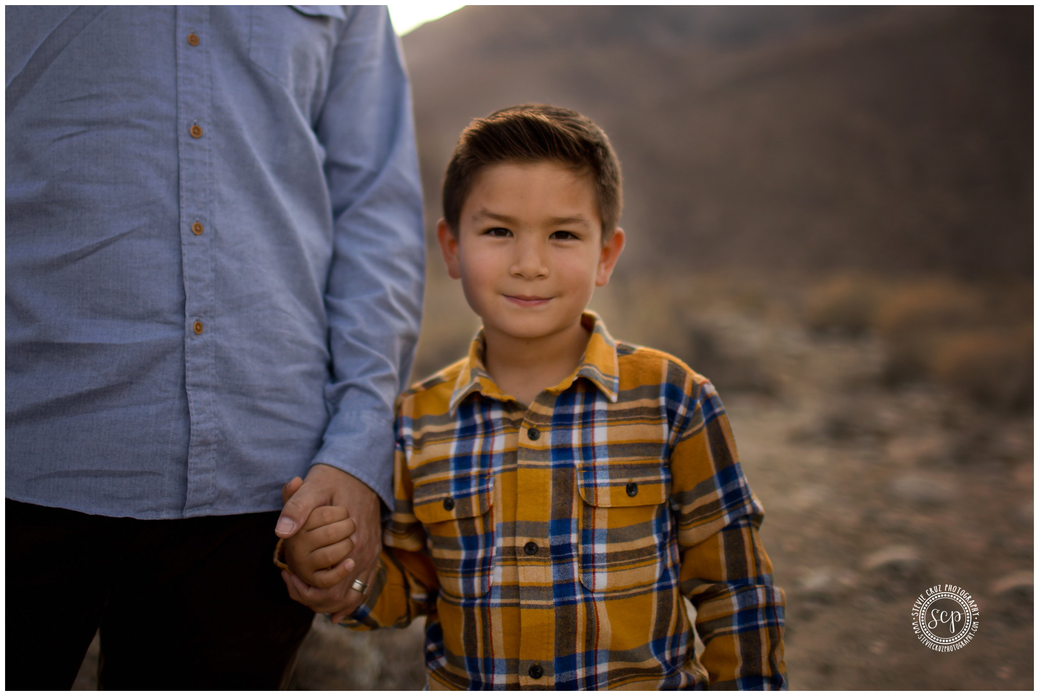 Plaid is always great outfit option for boys during family pictures. Photo by Stevie Cruz Photography